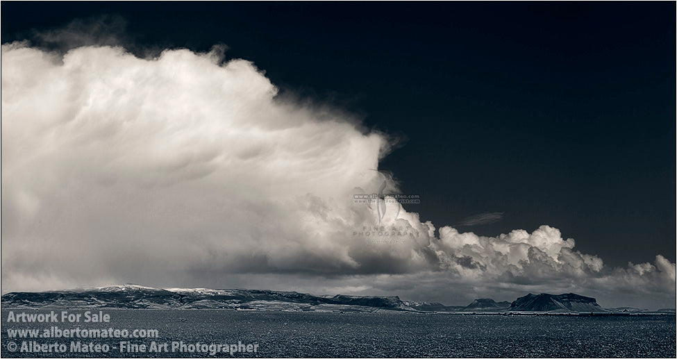 Petursey under storm clouds, Vik, Iceland.