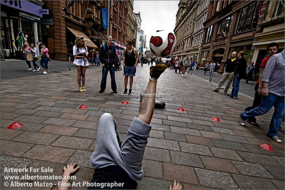 Football juggler exhibition in Glasgow, Scotland. | Open Edition Print.