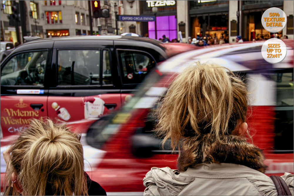 Women waiting at traffic lights in Oxford Circus, London. | 100% Detail View.