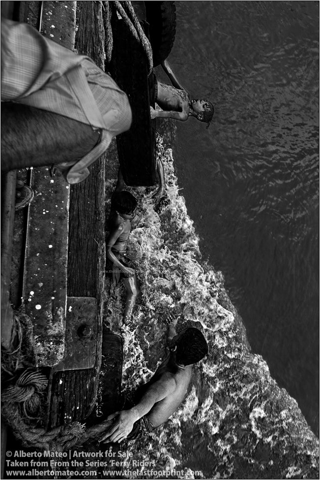 Ferry Riders climbing to ship deck, Kolkata, India.