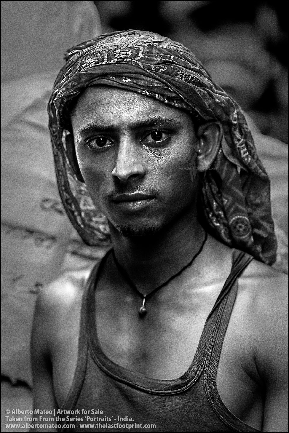 Young porter, Bara Bazar, Kolkata, India.