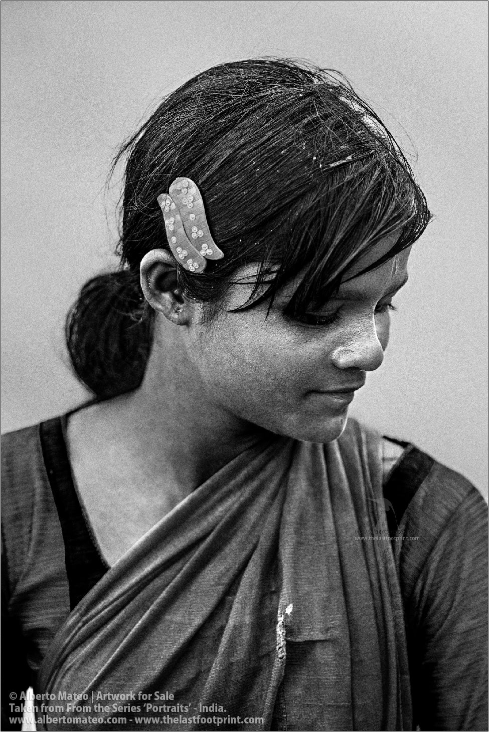 Portrait of clothes stone washer girl, Jharkhand, India.