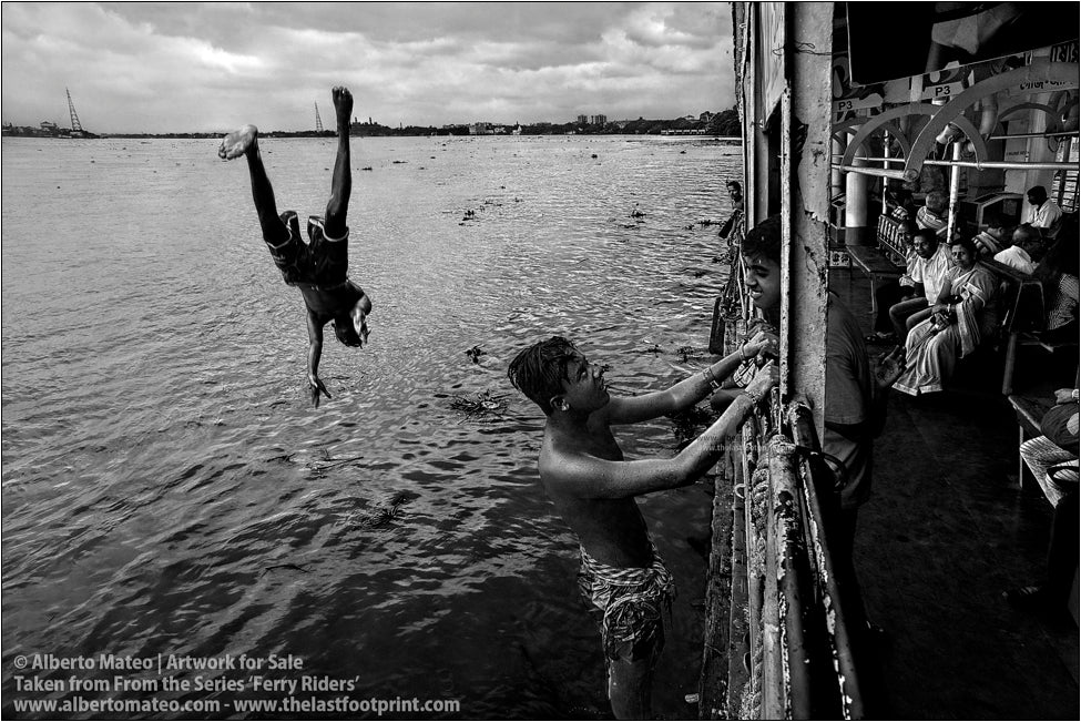 Ferry Rider chatting with passengers, Kolkata, India.
