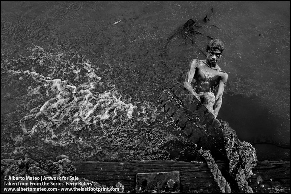 Ferry Rider climbing to ship deck, Kolkata, India.