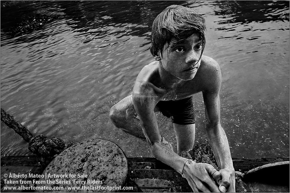 Ferry Rider on ship deck, Kolkata, India.