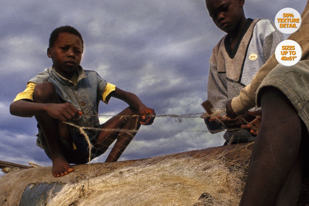 Children repairing nets, Cape Mclear, Malawi. | Detail.