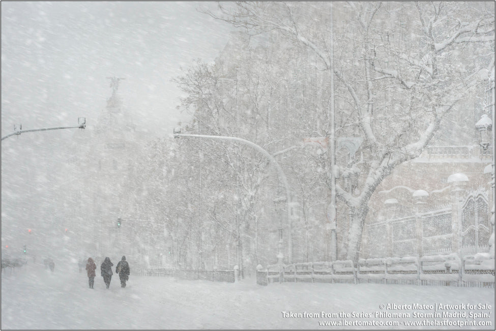 Pedestrians in Calle Alcala, Edificio Metropolis, Gran Via, Filomena Winter Snow Storm, Madrid, Spain.