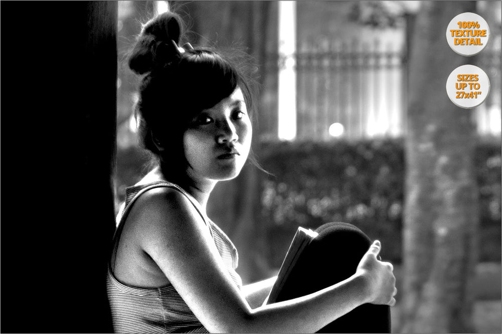Girl reading in Temple, Hanoi, Vietnam. | 100% Magnification Detail.