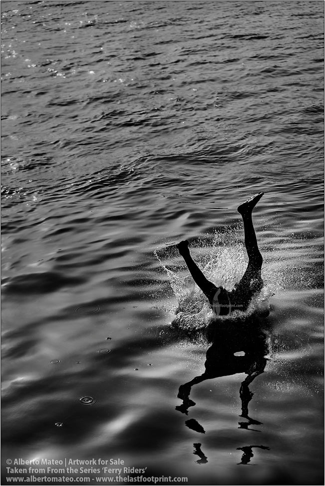 Detail of diving boy, Kolkata, India.