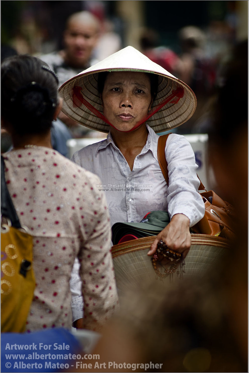Woman selling hats in Hanoi, Vietnam. | Open Edition Print.
