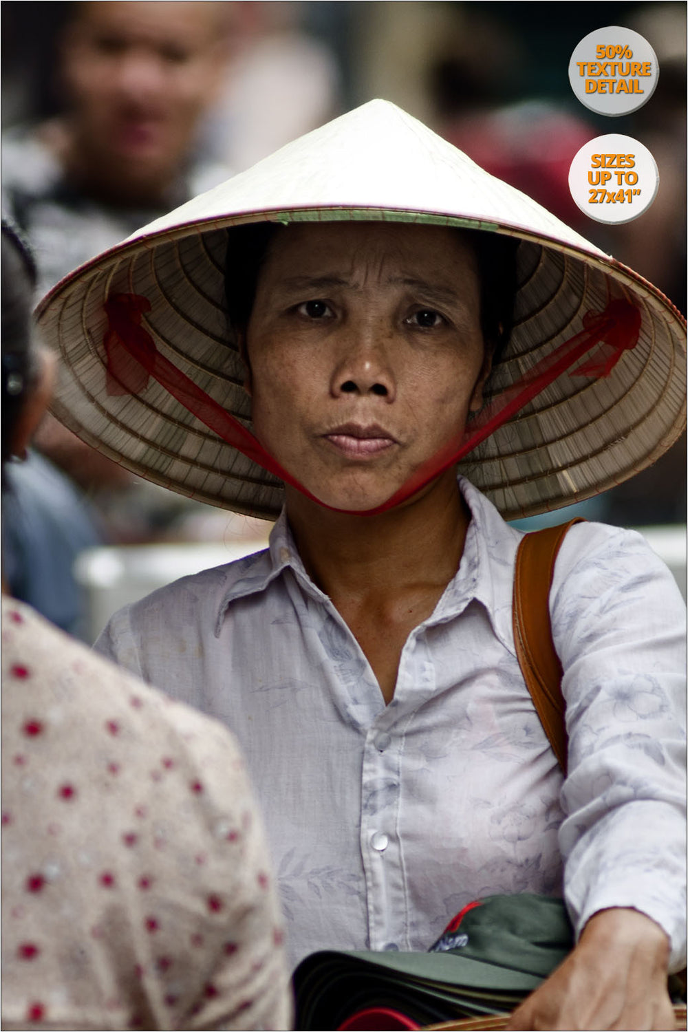 Woman selling hats in Hanoi old quarters, Vietnam. | 50% Magnification Detail.