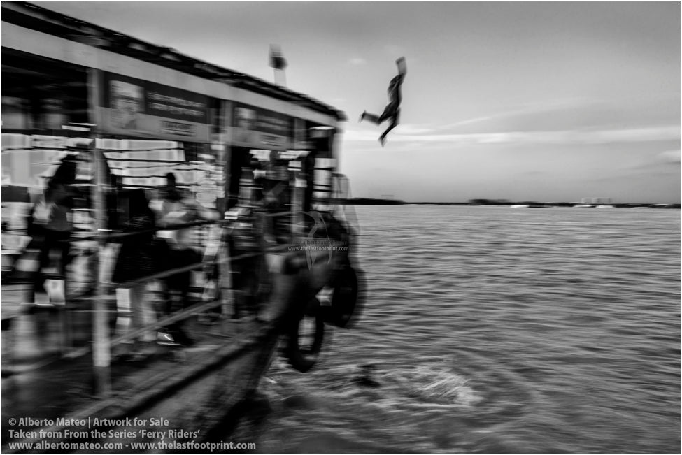 Jump from the roof of a ferry, Kolkata, India.