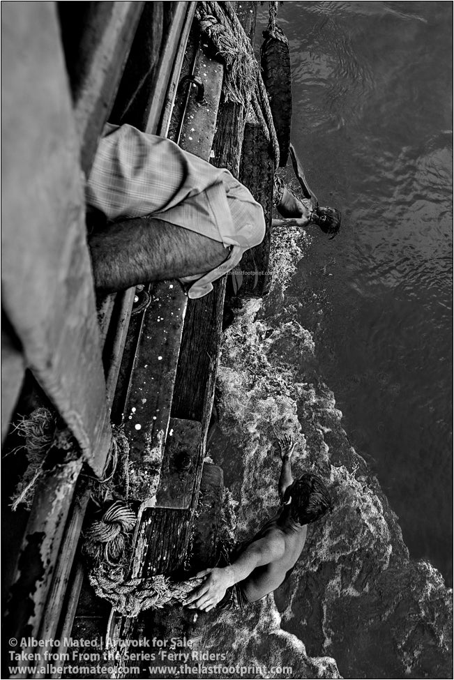 Ferry Riders climbing to ship, Kolkata, India.
