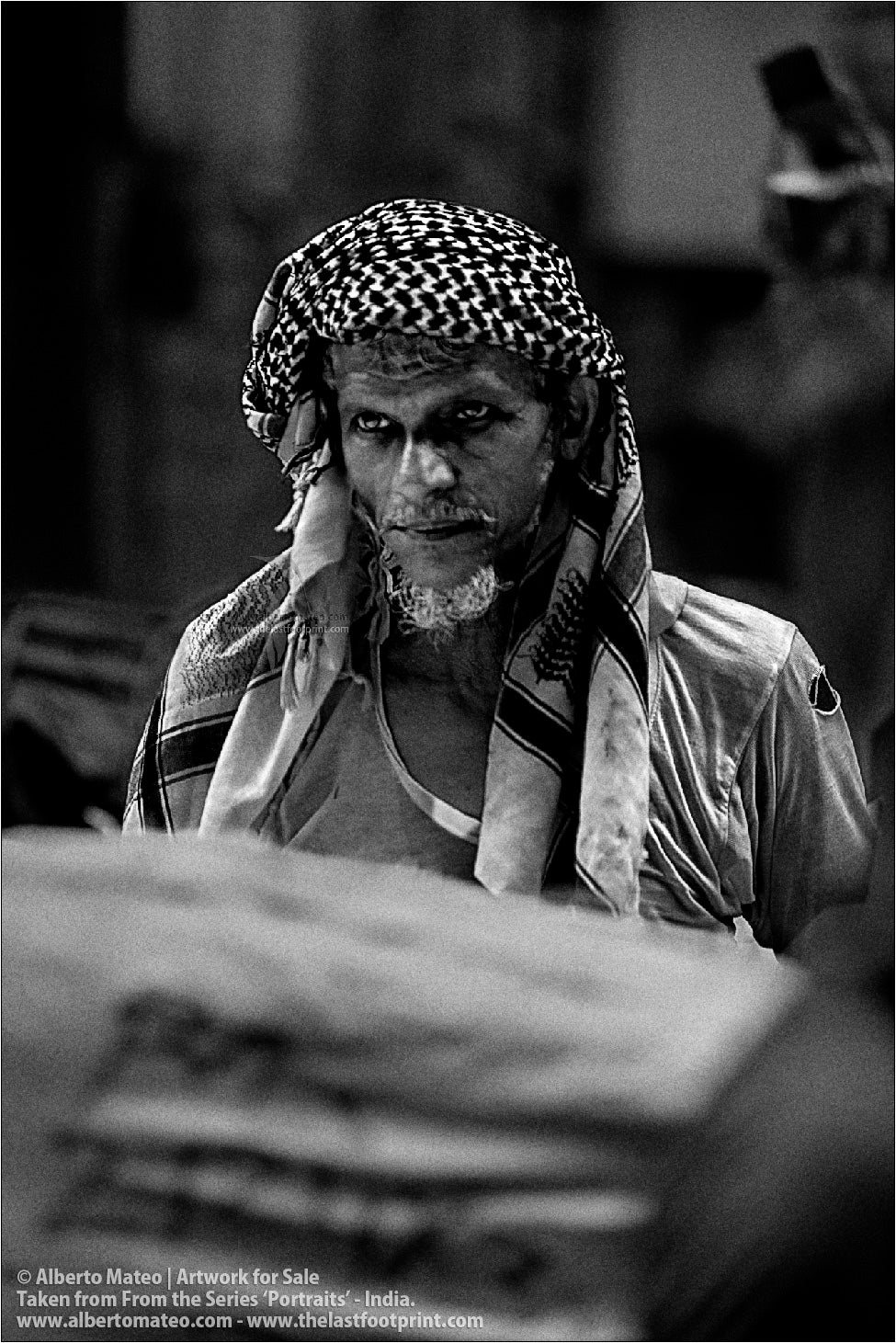 Portrait of thoughtful Porter, Bara Bazar, Kolkata, India.
