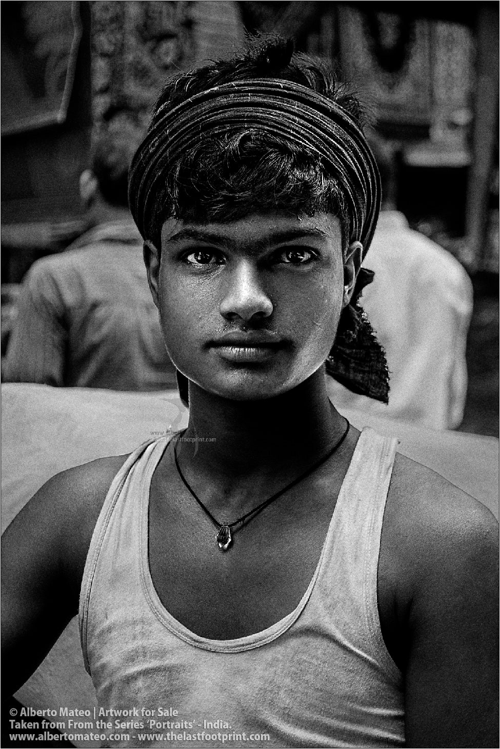 Portrait of young Porter, Bara Bazar, Kolkata, India.