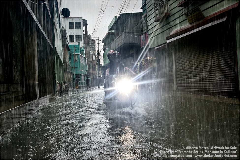 Motorbike under the rain, Shibpur, Kolkata, Bengal, India.
