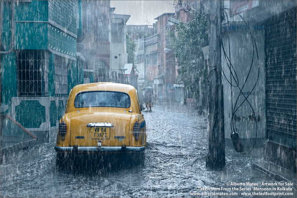 Ambassador Taxi under the rain, Shibpur, Kolkata, Bengal, India.