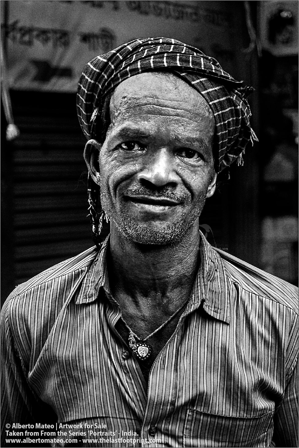 Portrait of Smiling Porter in Bara Bazar, Kolkata, India. [BLACK AND WHITE]