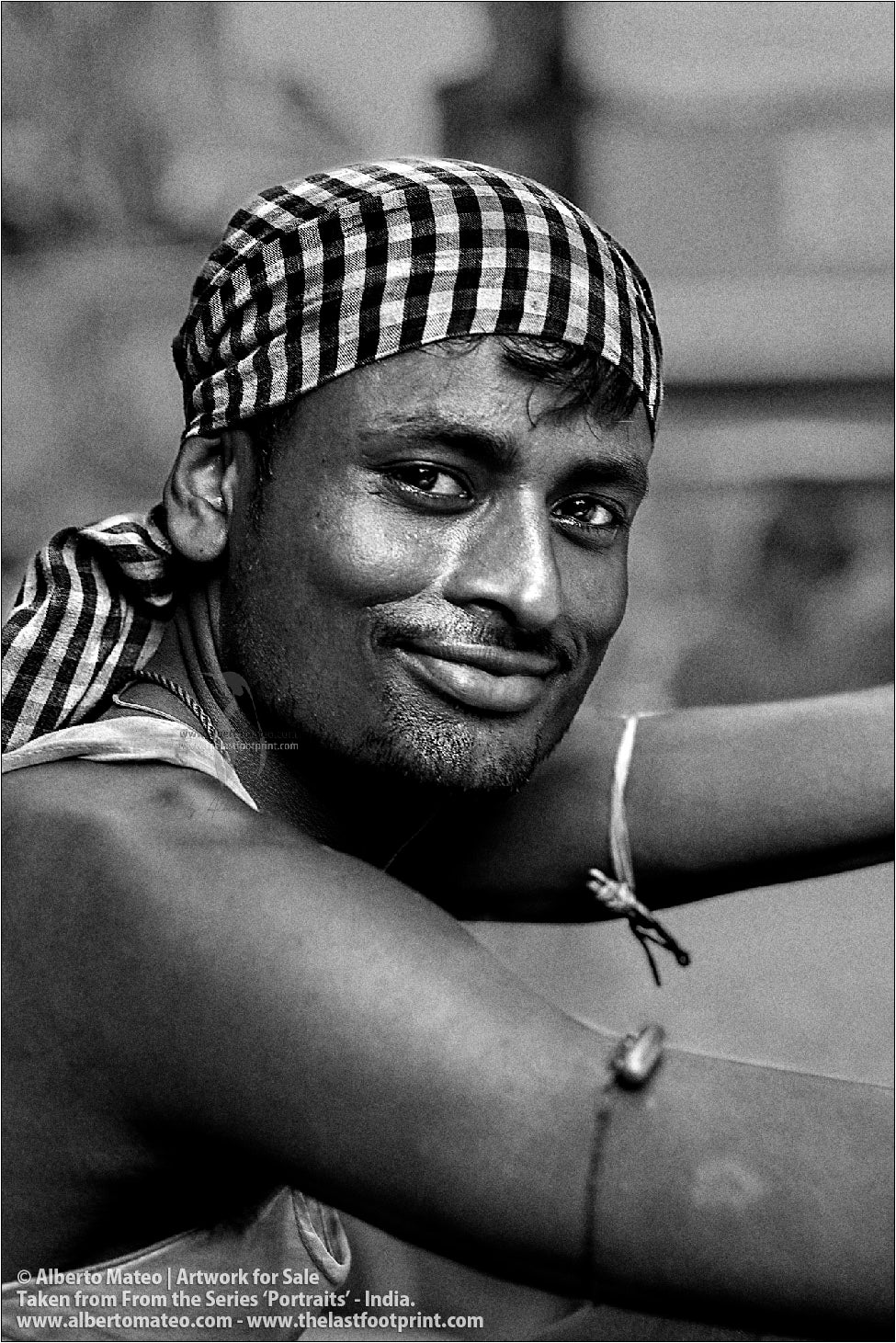 Portrait of Smiling Young Porter, Bara Bazar, Kolkata, India.