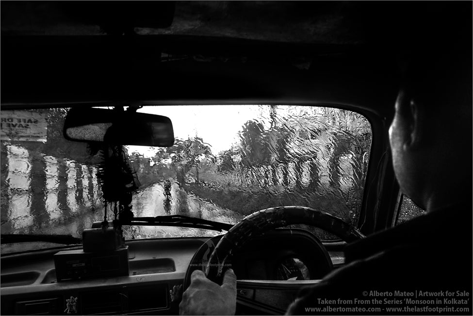 Ambassador Taxi under Monsoon rain, Shibpur, Kolkata, Bengal, India.