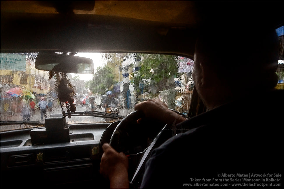 Pedestrians under Monsoon rain, Kolkata, Bengal, India.