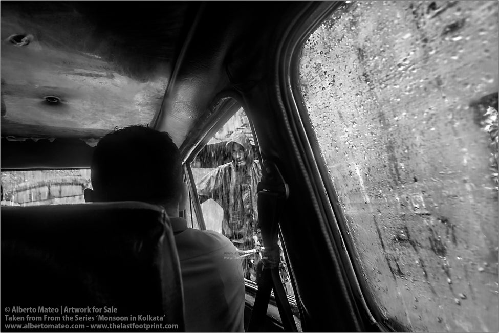 Rickshaw under Monsoon rain, Shibpur, Kolkata, Bengal, India.