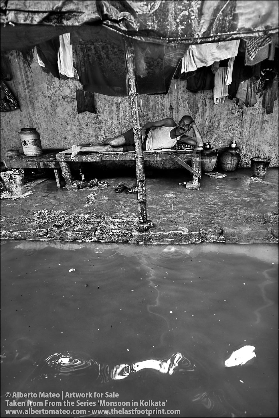 Man watching the flood, Monsoon rain, Kolkata, Bengal, India.