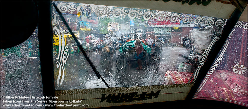 Porters pushing a loaded bicycle, Kolkata, Bengal, India.