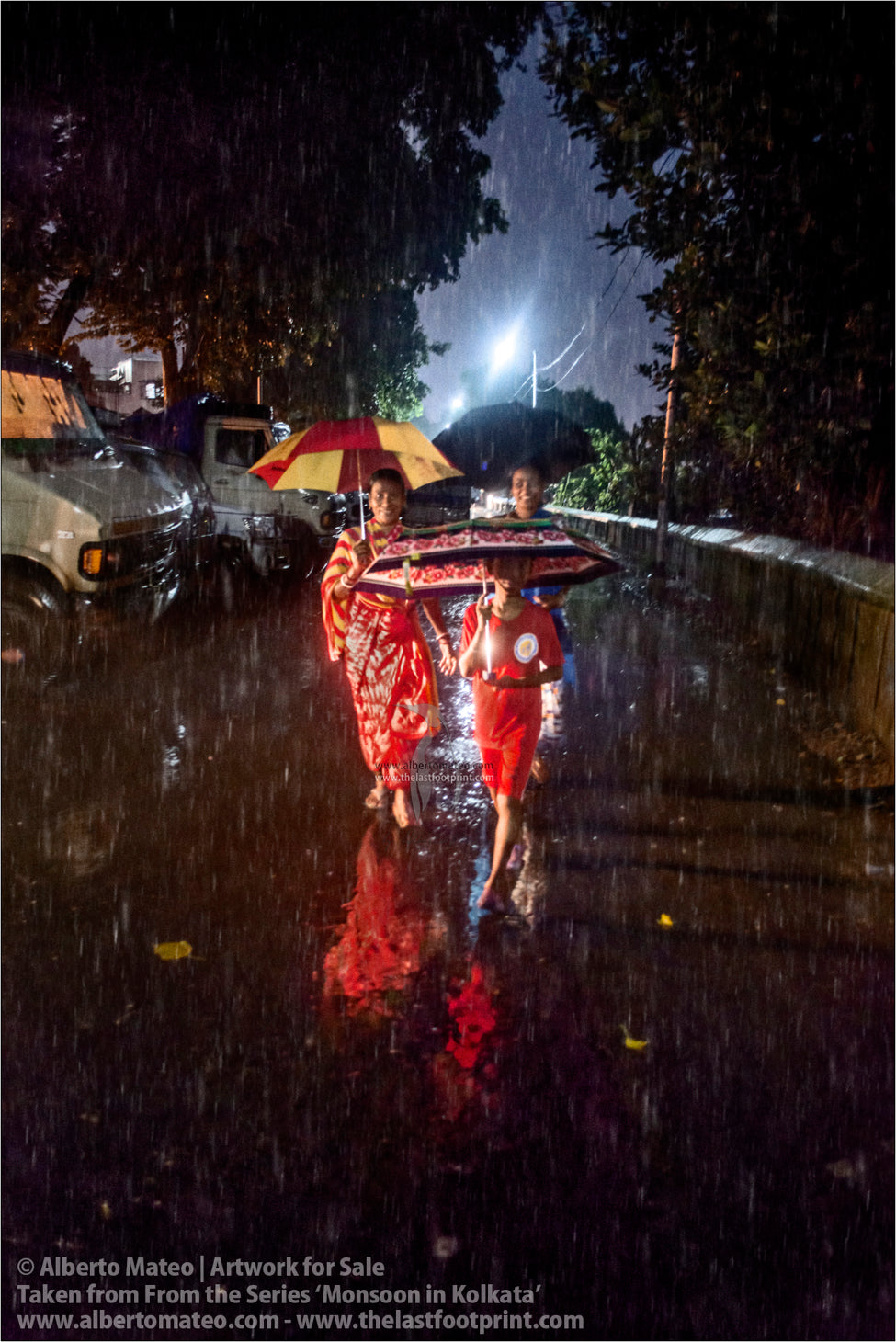 Two women with a child in Hooghly River ghats, Kolkata, Bengal, India.