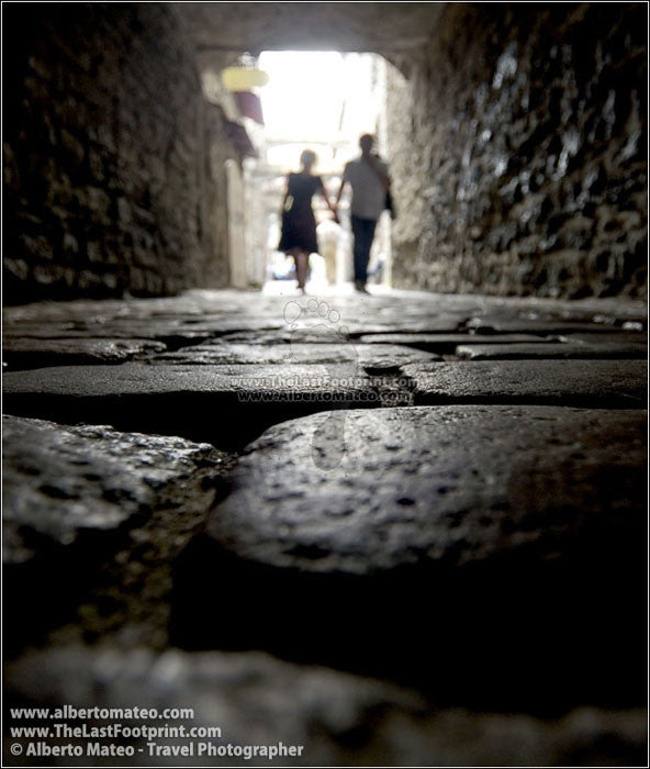 Couple in Tallinn old quarters, Estonia. | Cropped for Facebook.