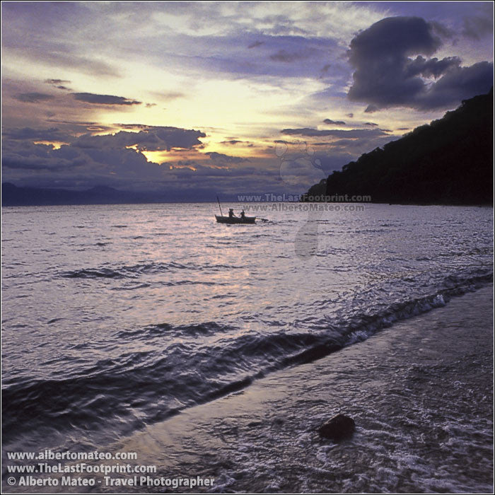 Fishermen boat at sunrise, Lake Malawi. | Square Crop.