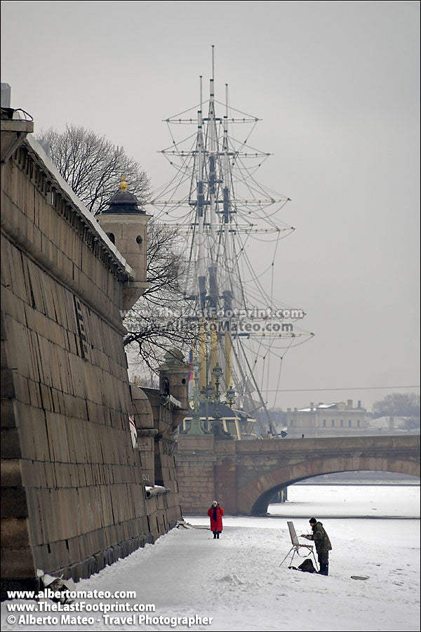 Painter over frozen Neva River, St. Petersbourg, Russia.
