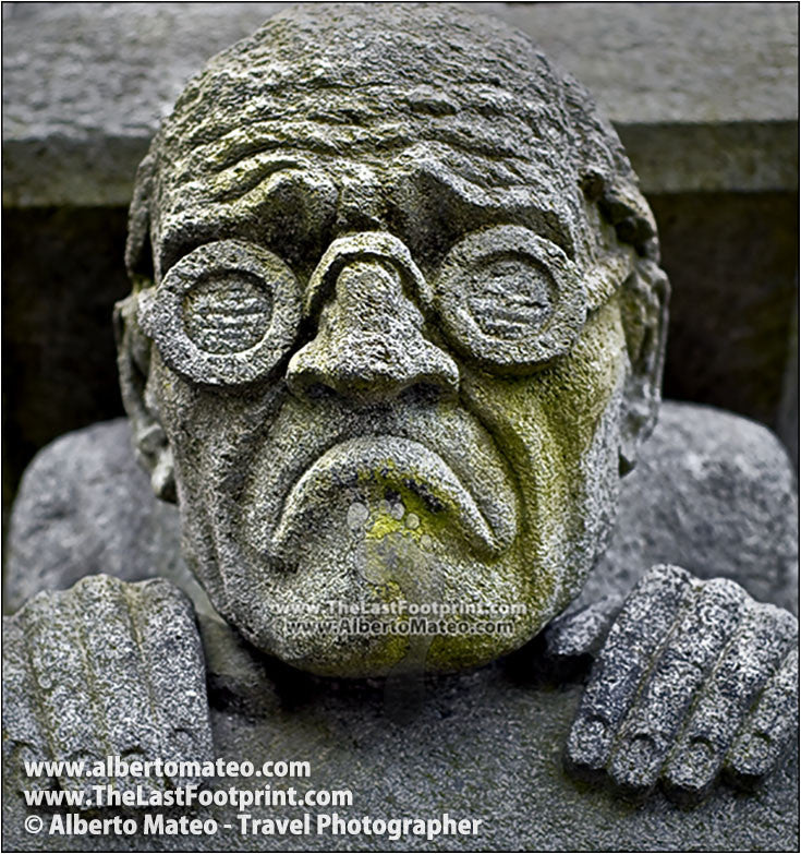 Stone sculpture in Bergen library facade, Bergen, Norway. | Square crop.