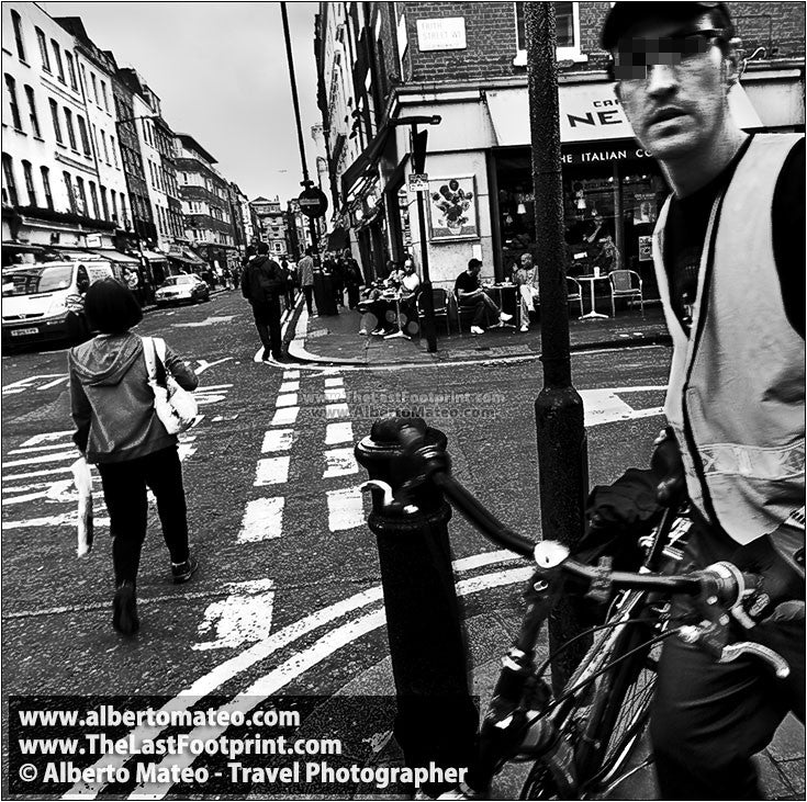Delivery man with bicycle in the SOHO, London, UK.