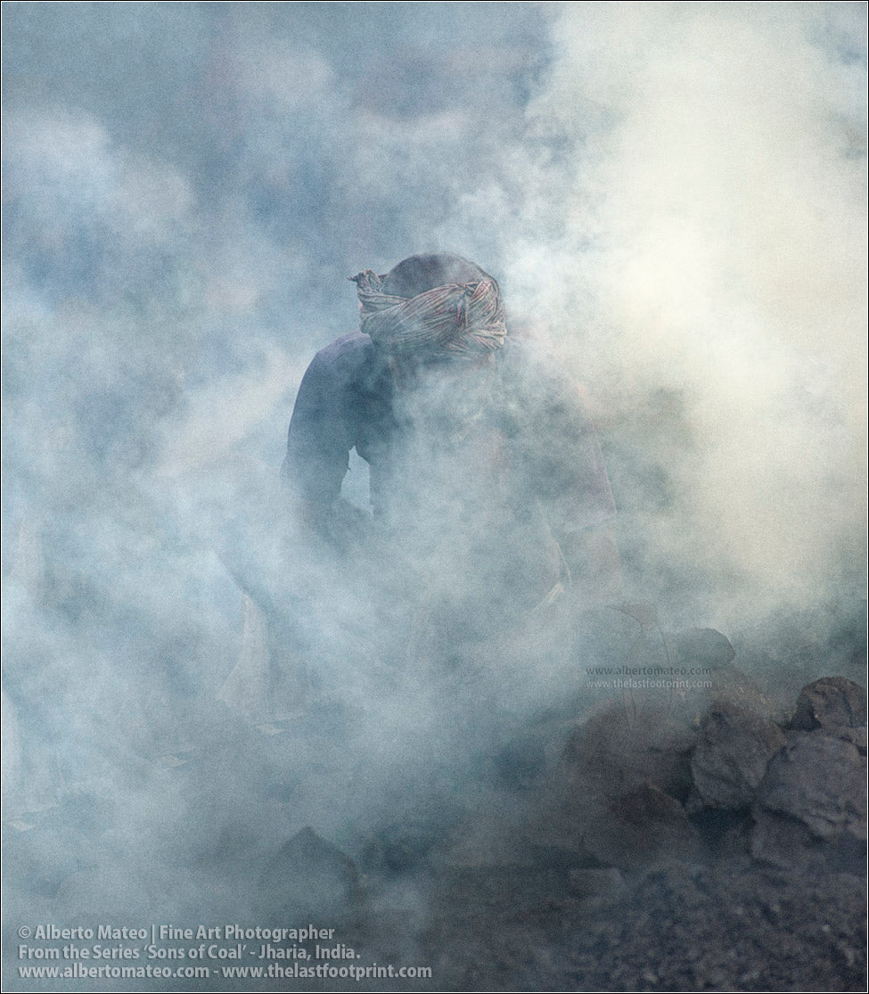 Man making Bonfire with Coal. Sons of Coal Series.
