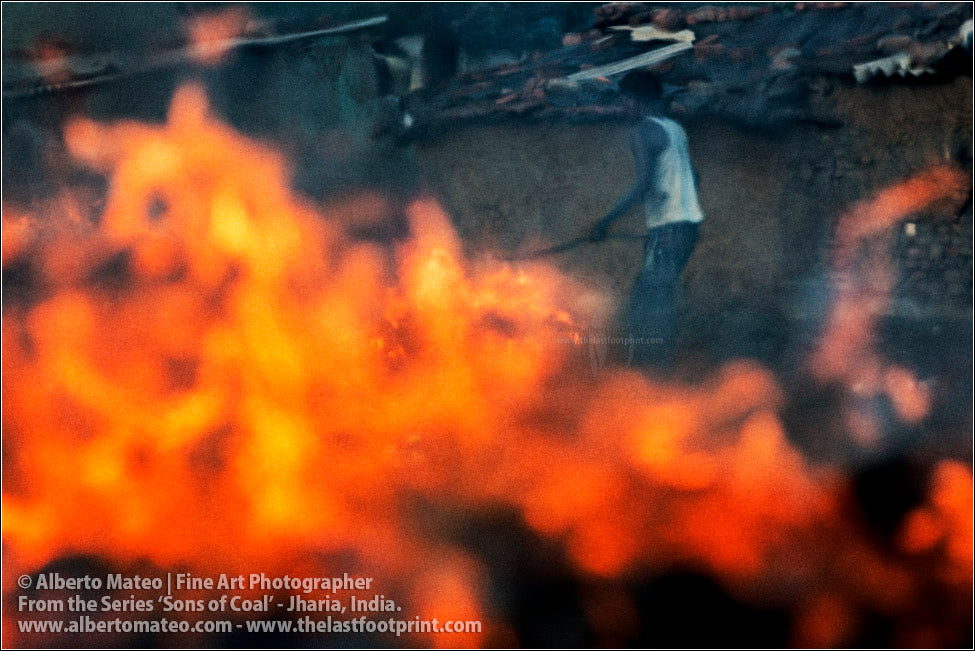Man making fire with Coal,  Sons of Coal Series.