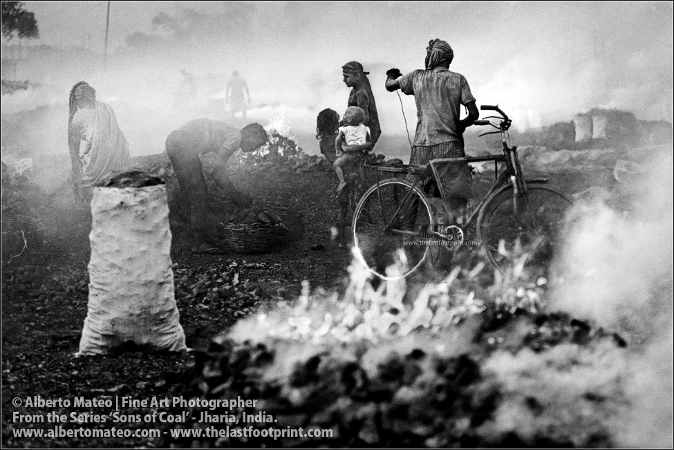 Men loading a Bicycle among Fires, Sons of Coal Series.