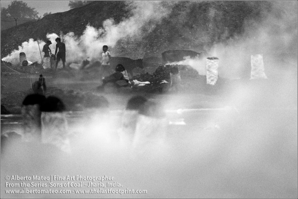 Men loading a bicycle with Coal Bags, Sons of Coal Series.