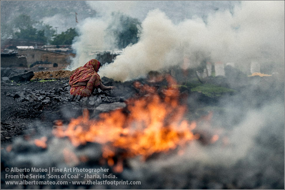 Woman making Coke Bonfire, Sons of Coal Series.