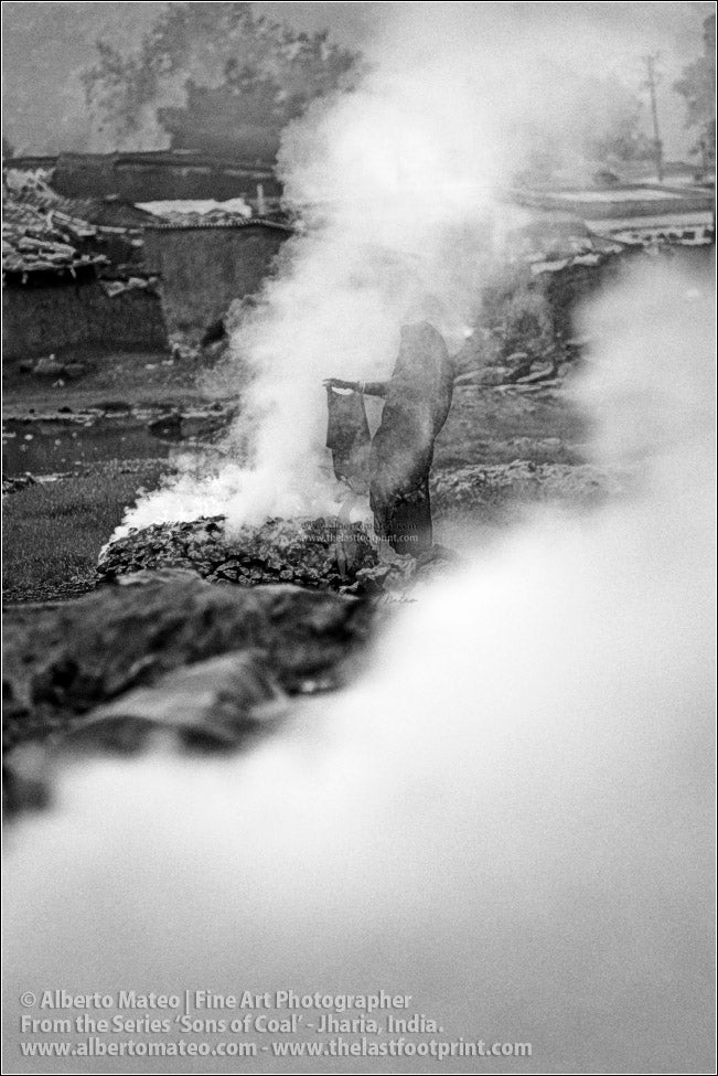 Woman drying Clothes in Smoke, Sons of Coal Series.