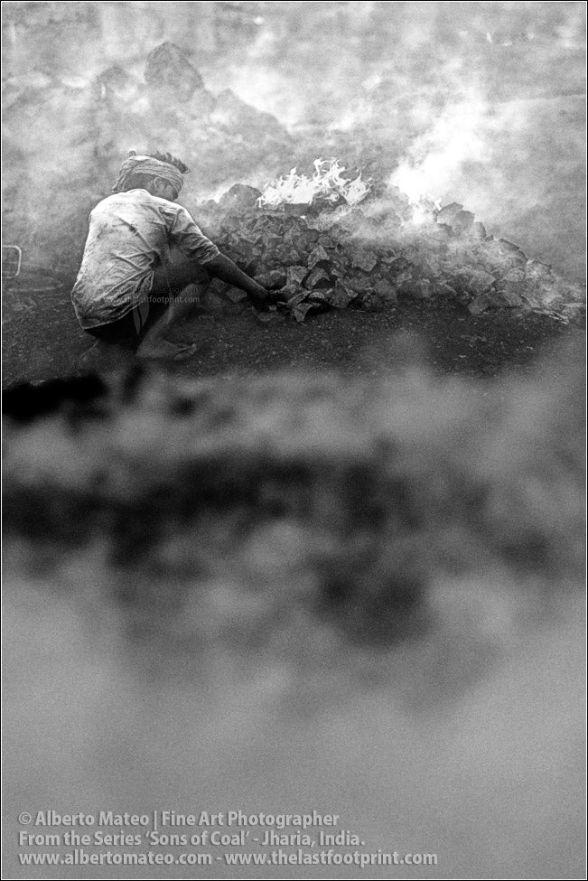 Worker making a Bonfire with Coal, Sons of Coal Series.