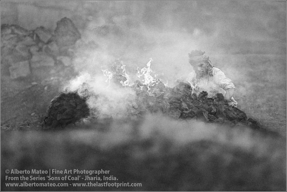 Worker making fire with Coal, Sons of Coal Series.