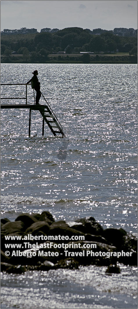 Woman on dock, Aeroskobing, Aero Island, Denmark. | Cropped detail.